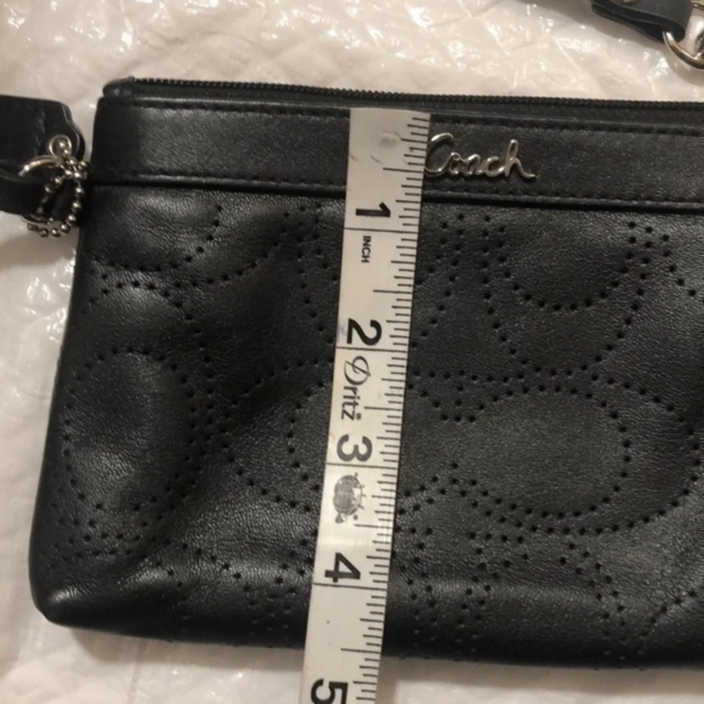 Coach signature perforated c wristlet bag